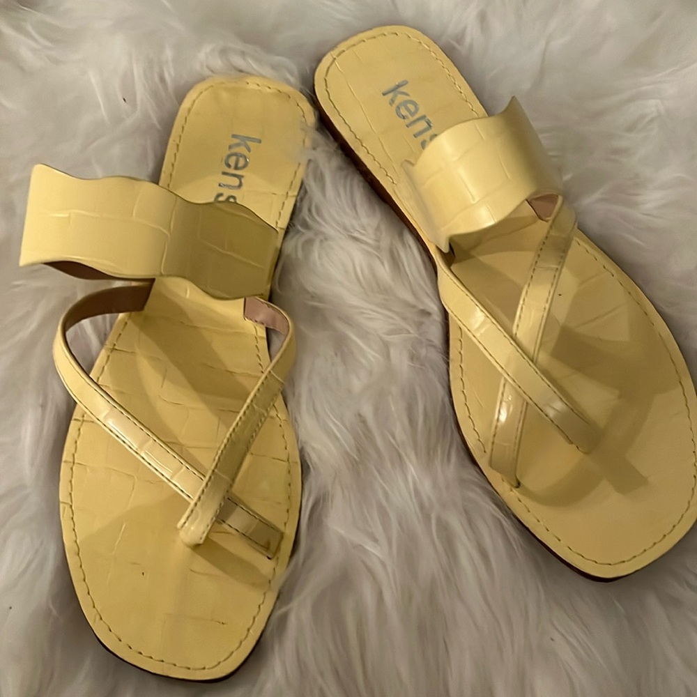Soft yellow toe strap sandals